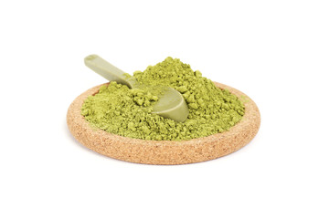 Powdered green tea with a green chocolate spoon from matches