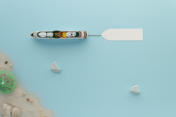 Cruise ship aerial view at sea . Sailboat beach star fish blue water background with copy space for...