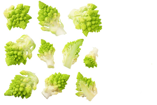 sliced romanesco broccoli isolated on white background. Roman cauliflower. top view