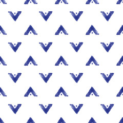 Vector seamless pattern ethnic indigo watercolor with white and blue chevrons and white background.