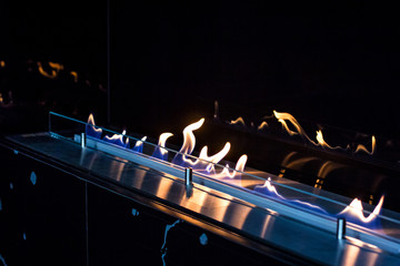 fire in a biofireplace.  Modern bio fireplot fireplace on ethanol gas.