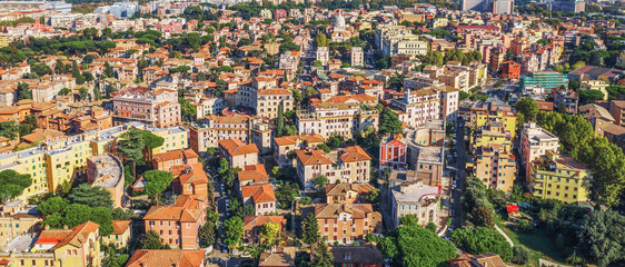 Obraz premium Rome cityscape aerial panorama of many buildings with orange roofs from above. Beautiful Italy city landscape.