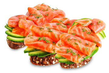 Smoked salmon avocado rye sandwich on a white isolated background