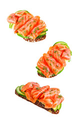 Smoked salmon avocado rye sandwich on a white isolated background