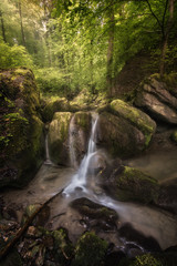 Golden light over a small waterfall