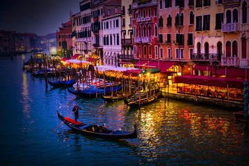 blue grand canal at night with gondola