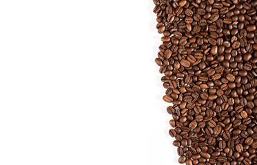 Coffee beans on a white background with place for text.