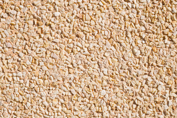 close-up of stucco wall with small stones
