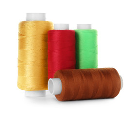 Set of color sewing threads isolated on white