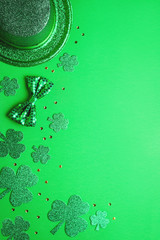 Happy Saint Patrick's Day greeting card with traditional symbols, shamrock, green attire. Green...