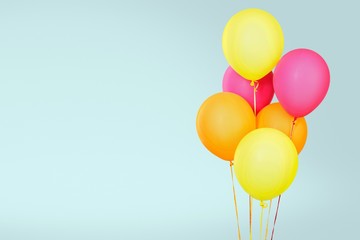 Bunch of colorful balloons on pastel background