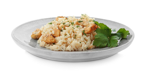 Delicious risotto with chicken isolated on white