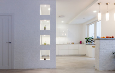 Modern white kitchen without handles