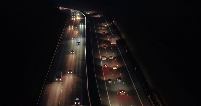 Drone footage of vehicles moving on highway at night, Baden-Wuerttemberg, Germany