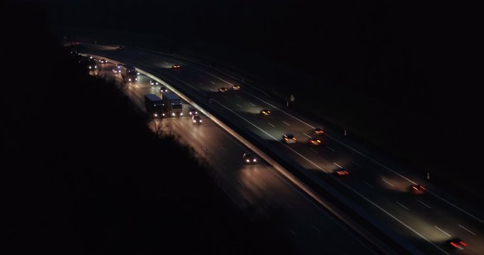 Drone footage of vehicles moving on highway at night, Baden-Wuerttemberg, Germany
