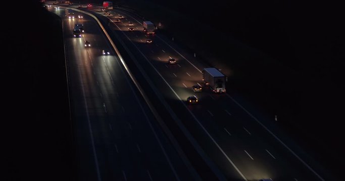 Drone footage of vehicles moving on highway at night, Baden-Wuerttemberg, Germany