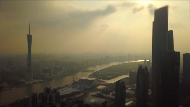 guangzhou cityscape sunset time ctf building canton tower river aerial panorama tilt-shift 4k china