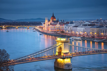 Famous Chain Bridge with the Hungarian Parliament in the background
