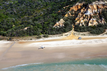 coloured sands, beach and sea at fraser island aerial view