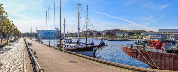 High resolution panorama of the port of Kiel on a sunny day - obrazy, fototapety, plakaty