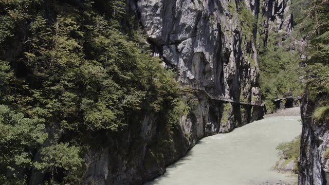 Drone footage of river amidst mountains, Aareschlucht, Berner Oberland, Switzerland