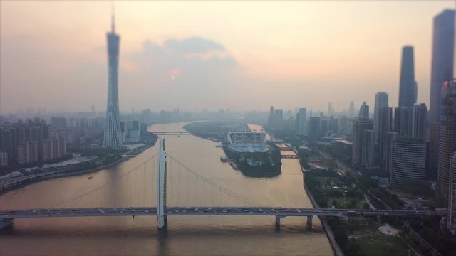 sunset sky guangzhou city canton tower liede bridge river island aerial panorama tilt-shift 4k china