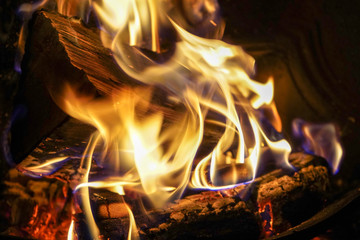 Close up of burning logs on a open fire 