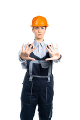 Female engineer builder shows hand gestures STOP. Isolated