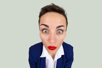 Funny shock. Closeup portrait head shot business woman, employee, funny looking female, shocked,...