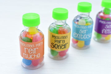 Concept of positive phrases, represented in colorful candies