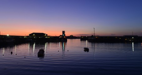 Victoria and Albert piers, Jersey, U.K. Winter sunset getting lighter evenings.