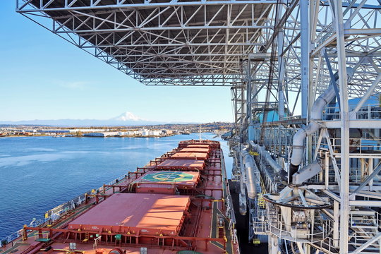 Cargo terminal for loading grain cargo by shore cranes. Port Tacoma,WA, USA. October, 2019.