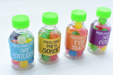 Concept of positive phrases, represented in colorful candies