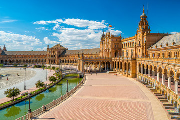 The beautiful Plaza de Espana in Seville on a sunny summer day. Andalusia, Spain. - obrazy, fototapety, plakaty