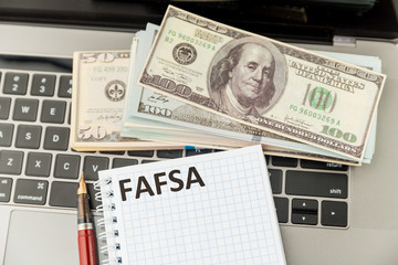 Fafsa. Student aid application form on the tablet