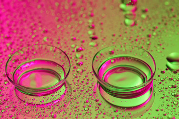 Contact lenses on color background