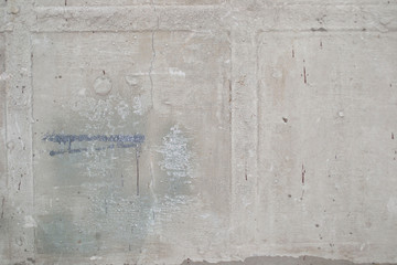 top view of square prints on concrete wall