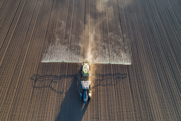 Aerial image of tractor working in field