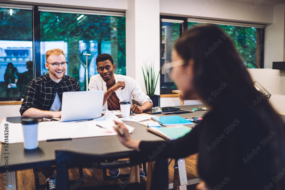 Aufkleber smiling millennial remote workers discussing ideas during teamwork for university learning and exam 