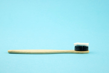 Bamboo eco toothbrush with natural bristles and paste without chemical additives. Recycling. Zero waste. Oral care