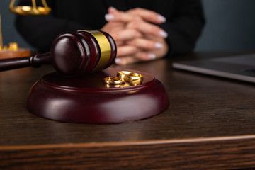 Judge gavel deciding on marriage divorce .