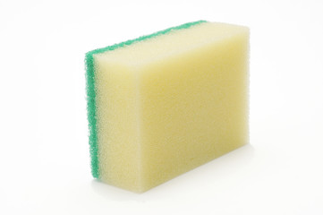 Sponge for washing dishes and plumbing on a white background