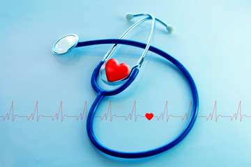 Heart, medicine stethoscope and pulse on blue background. Healthcare and medical concept