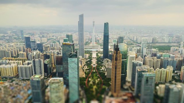 sunny day guangzhou city downtown tianhe district square aerial tilt shift panorama 4k timelapse china
