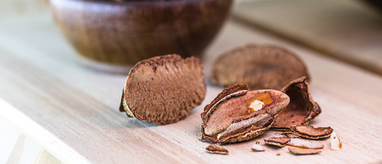 Brazil nut, with shell. Culinary ingredient from brazil.