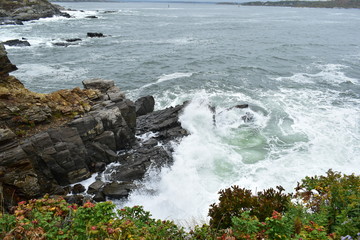waves crashing on rocks