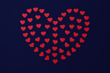 Heart background for a Valentine day card, with a space for text. Matrix with space for your creativity on a blue background.