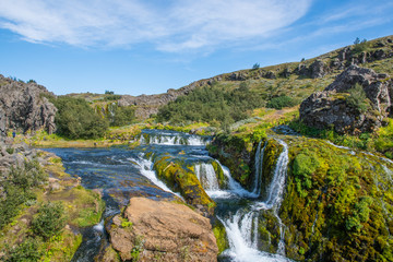 Fototapeta na wymiar Waterfall in Gjain in thjorsardalur valley in South Iceland
