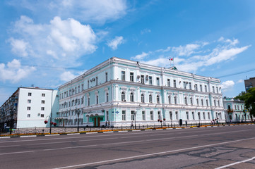 Fototapeta na wymiar Russia, Blagoveshchensk, July 2019: Administration building in the city center in Blagoveshchensk in summer