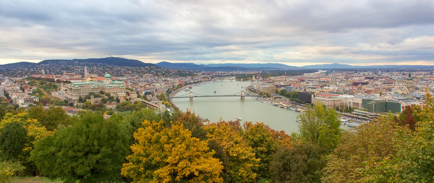 Panoramic view from Gellert Hill on landmarks of Budapest at autumn sunset, Hungary
